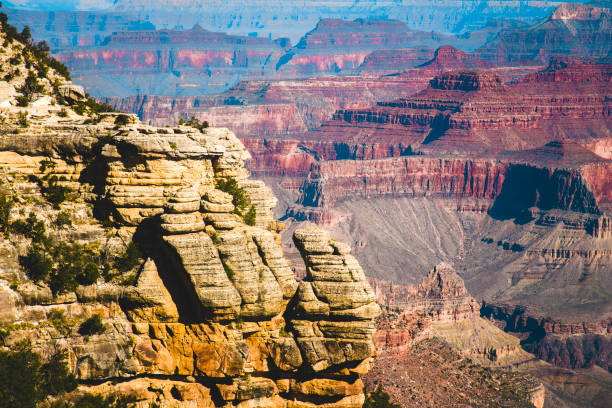 Aerial view overlooking the majestic Grand Canyon in Arizona a hot summer day in the desert.