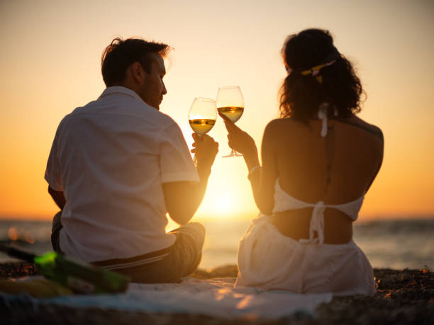 istock Young couple with sun on beach 1269484107