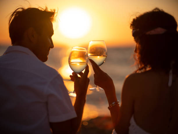istock Young couple with sun on beach 1269484112