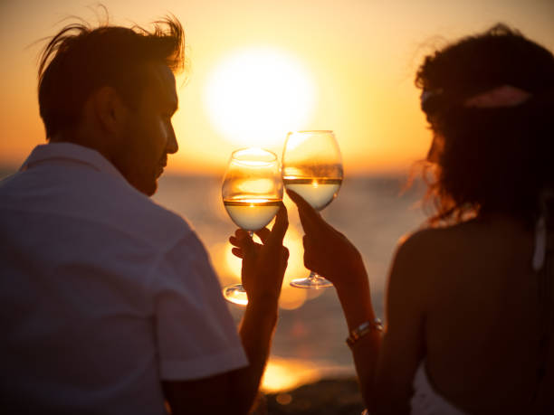 Young couple with sun on beach