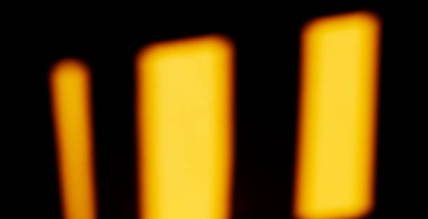 istock Golden yellow rectangle shapes on a black background 1269487511