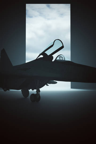 istock Supersonic Jet Aircraft in a Dark Hanger 1269490841