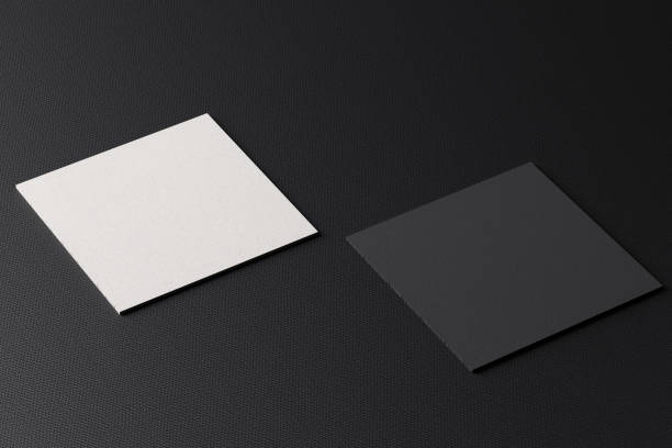 istock White square shape paper business card mockup on black modern fabric table background. Branding presentation template print graphic design. Two cards mock up. 3D illustration rendering 1269493598