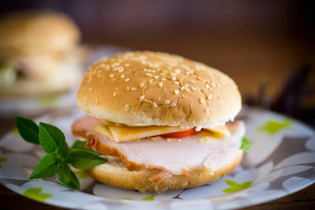 istock morning sandwich with bacon, cheese and herbs 1269493912