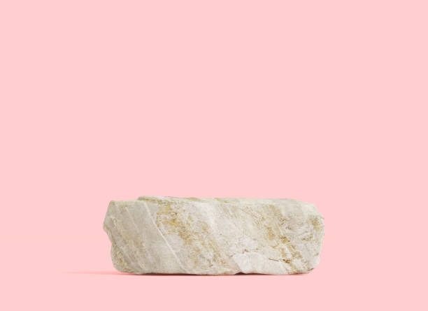 istock Stone podium for display product on pink background. 1269494051
