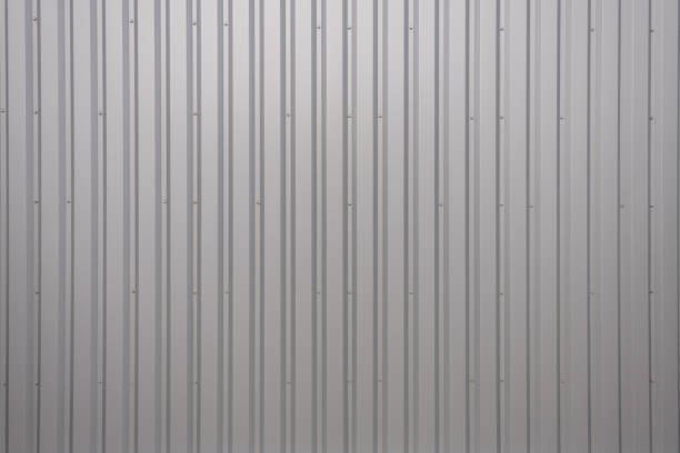 Texture of a wall of metal sheet metal as background Close-up of an aluminum texture at a warehouse in Berlin cladding construction equipment photos stock pictures, royalty-free photos & images