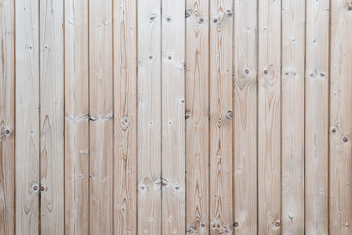 close up of an old and weathered wood crate with light coming through some slats for sale as home decor at a salvage yard, Long Island, New York