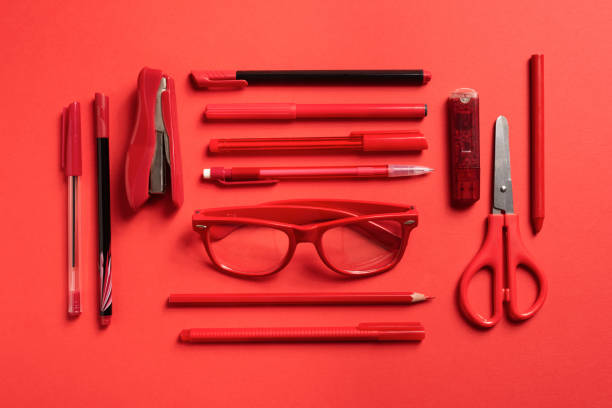 Stationery for school or office on a colored background.Flat