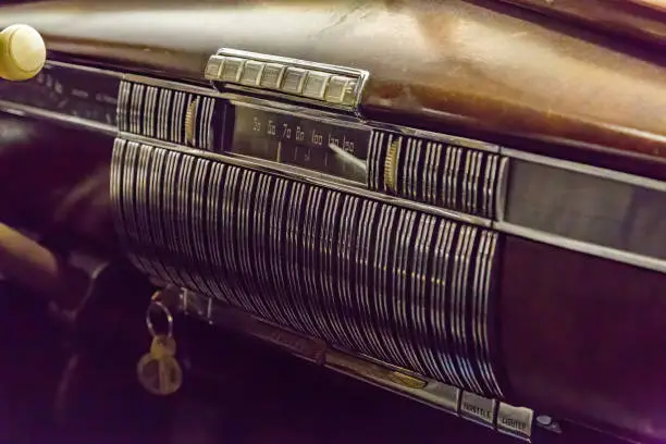 Photo of Vintage push button radio in old car