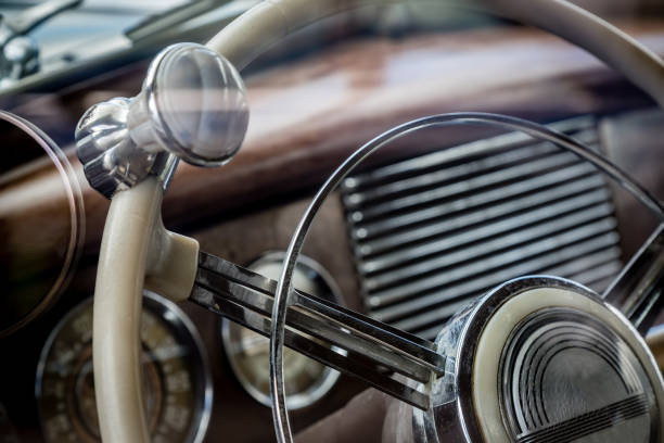 Close-up of a steering wheel in vintage car stock photo