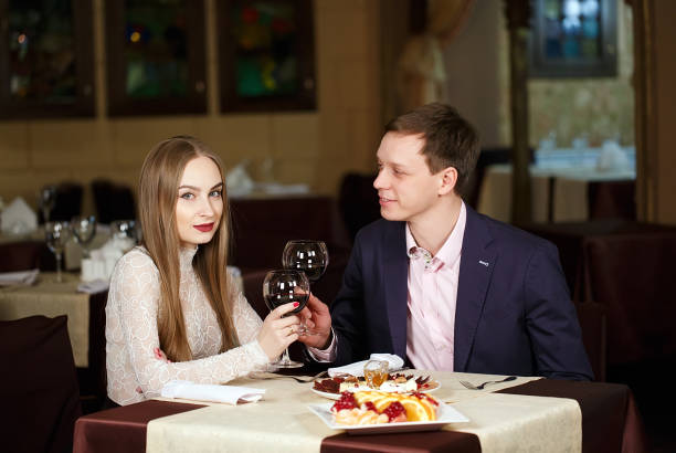istock Couple toasting wineglasses in a luxury restaurant. 1269500131