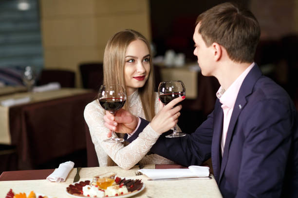 istock Couple toasting wineglasses in a luxury restaurant. 1269500241