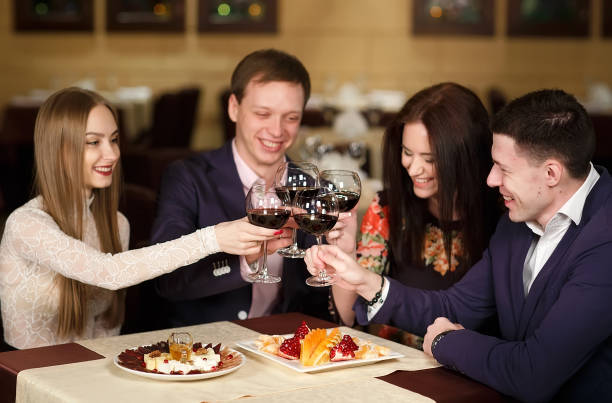 istock Friends at a restaurant drinking red wine. 1269500334