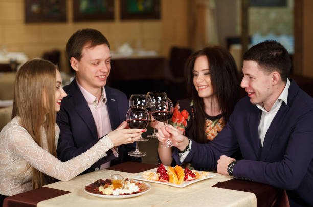 istock Friends at a restaurant drinking red wine. 1269500343