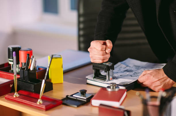 istock Concept. Spy takes on the photo documents. Thief in the office. 1269505565