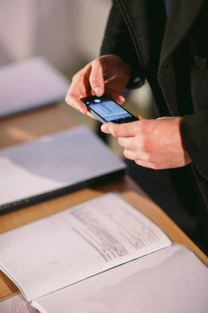 istock Concept. Spy takes on the photo documents. Thief in the office. 1269505568