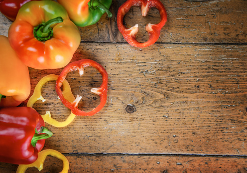 Fresh Peppers on Wooden Background with Copy Space