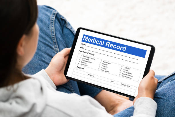 istock Woman Patient Using Hospital Record 1269509468
