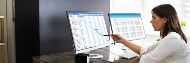 istock Employee Working On Calendar Schedule 1269511035