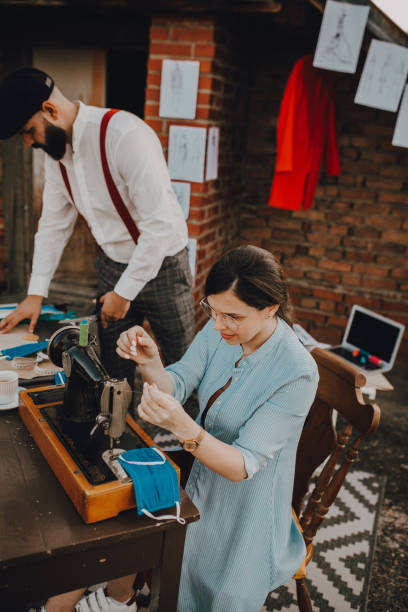 istock Female worker making medical mask on a sewing machine 1269511232