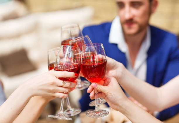 istock Friends drinking wine on the summer terrace. 1269511779