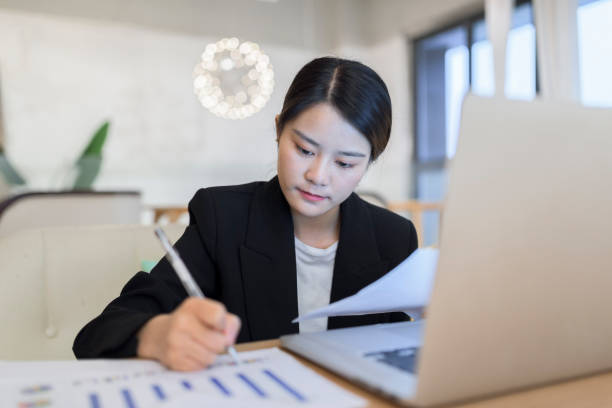 istock Asian woman working at home. 1269513977