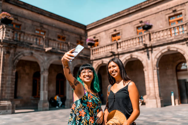 istock Two young women taking a selfie 1269515818