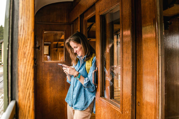 istock Woman traveling by train 1269517359