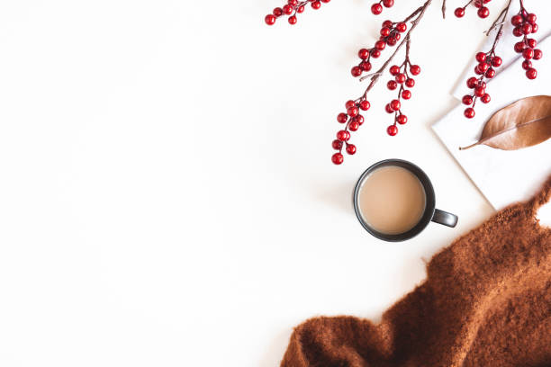 istock Autumn composition. Cup of coffee, plaid on white background. Autumn, fall concept. Flat lay, top view 1269521885