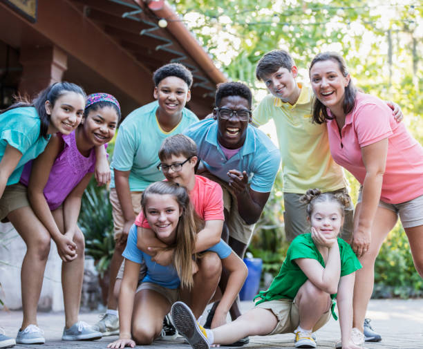 istock Summer camp including two down syndrome children 1269522688