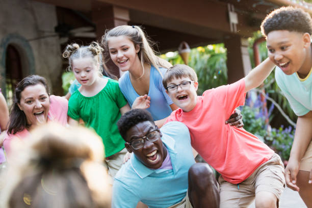 istock Summer camp including two down syndrome children 1269522808