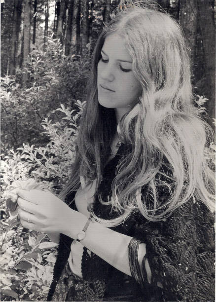 Retro seventies woman Black and whit retro picture of a young woman in the seventies 1970s woman stock pictures, royalty-free photos & images