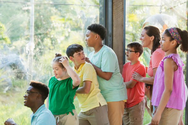 istock Summer field trip to zoo, including children with downs 1269527245