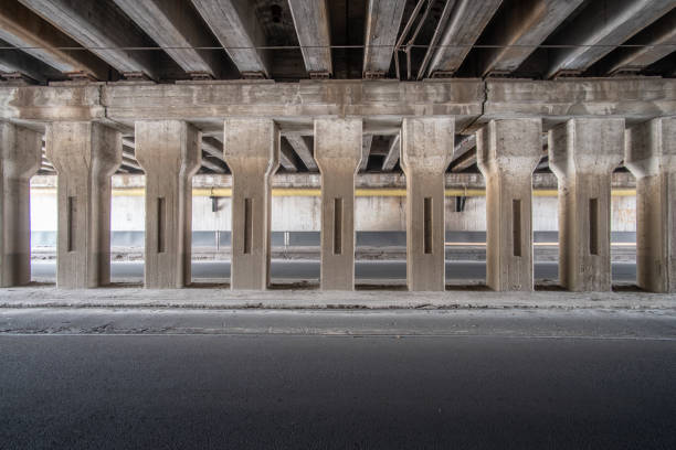istock A row of columns inside an old empty car tunnel. 1269527494