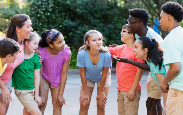 istock Summer camp including two down syndrome children 1269534284