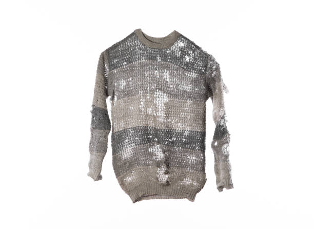 istock torn clothes,old gray wool sweater isolated on white background 1269543382