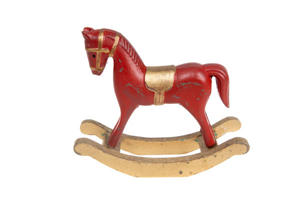 istock Red vintage rocking horse, isolated on white 1269544636