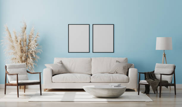 istock Blank picture frame mock up in light blue room interior , 3d rendering 1269545792