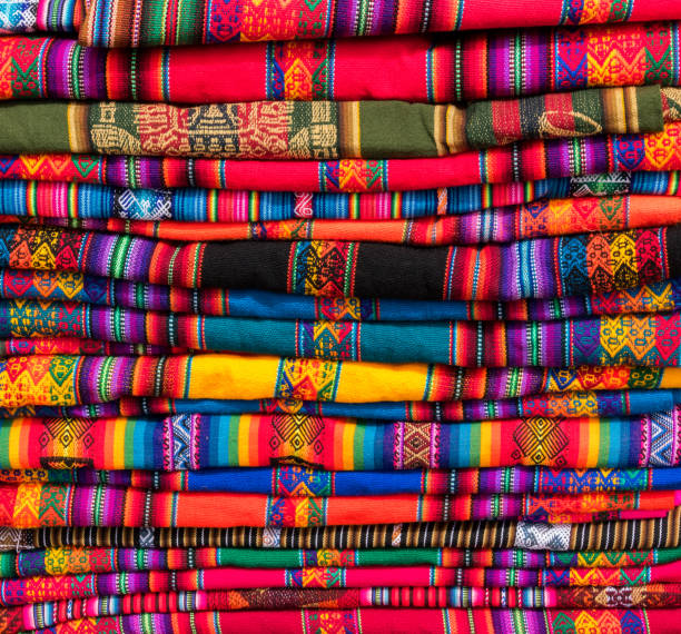 istock Peruvian traditional colourful handicraft textile fabric in Cusco, Peru 1269553853
