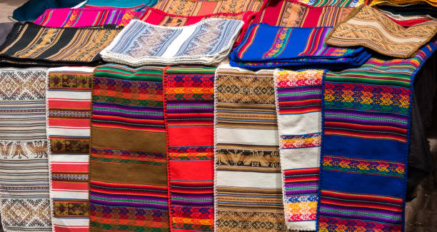 istock Peruvian traditional colourful handicraft textile fabric in Cusco, Peru 1269553990