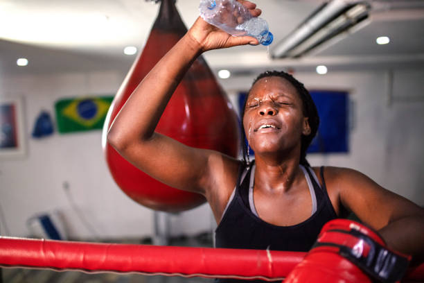 istock Beautiful Young Woman After Boxing Workout 1269556635