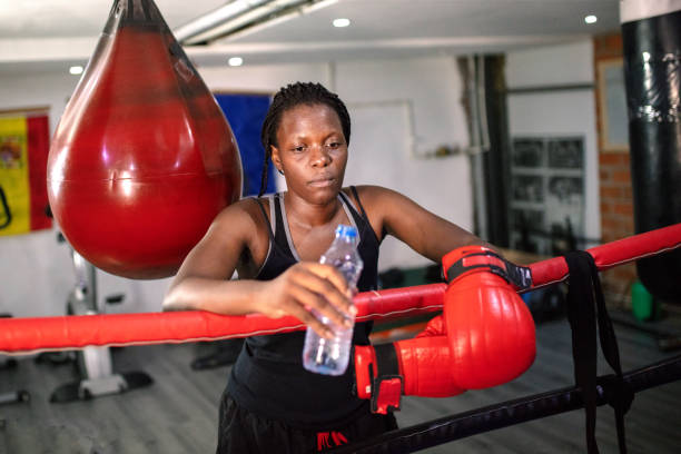 istock Beautiful Young Woman After Boxing Workout 1269556651