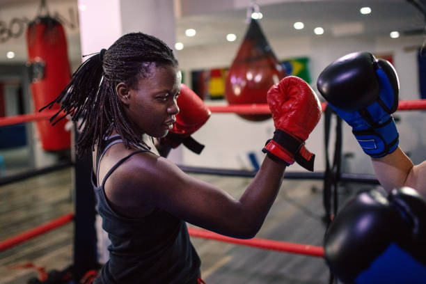 istock Female figher in a boxing ring 1269557005