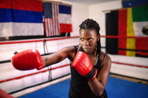 istock Female figher in a boxing ring 1269557010