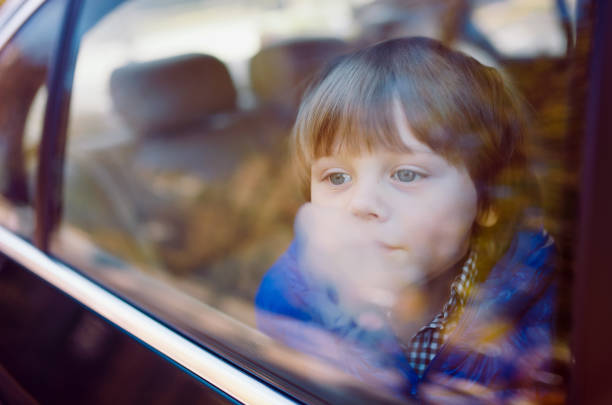 Baby boy in the car.