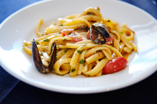 Scialatielli Pasta with Seafood, traditional food in Naples, Italy