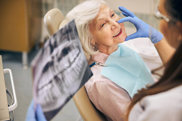 istock Happy lady making regular check up in modern clinic 1269563125
