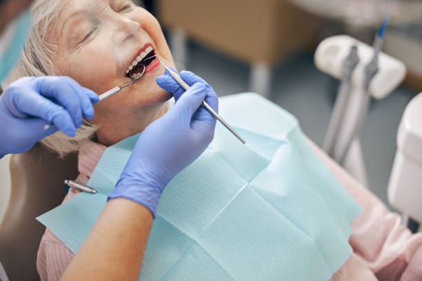 istock Woman visiting dentist for make her teeth 1269563649