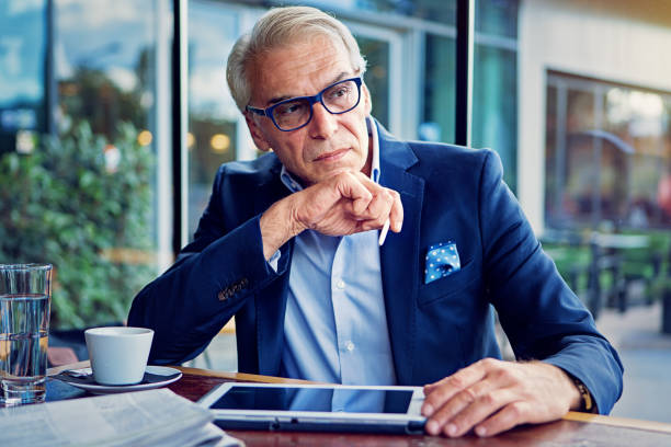 istock Businessman is working with digital tablet in the cafe 1269564768