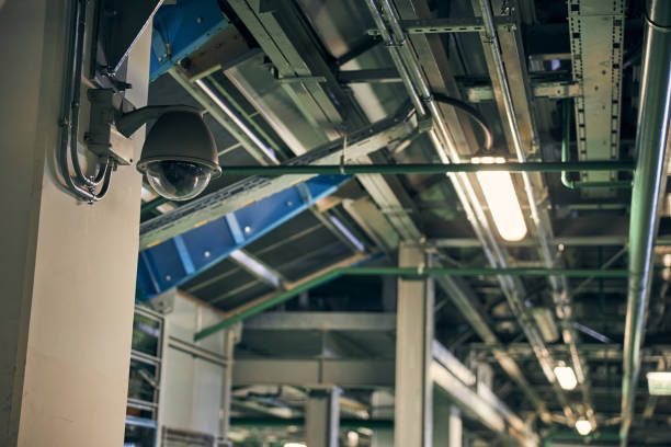 istock Security surveillance camera on a wall of a building 1269570274